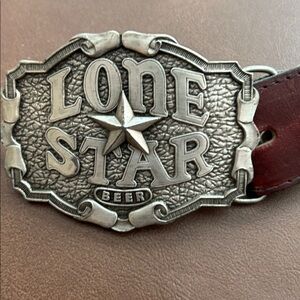 Love Star Belt Buckle also a bottle opener 
Groovy belt from Mexico. 38